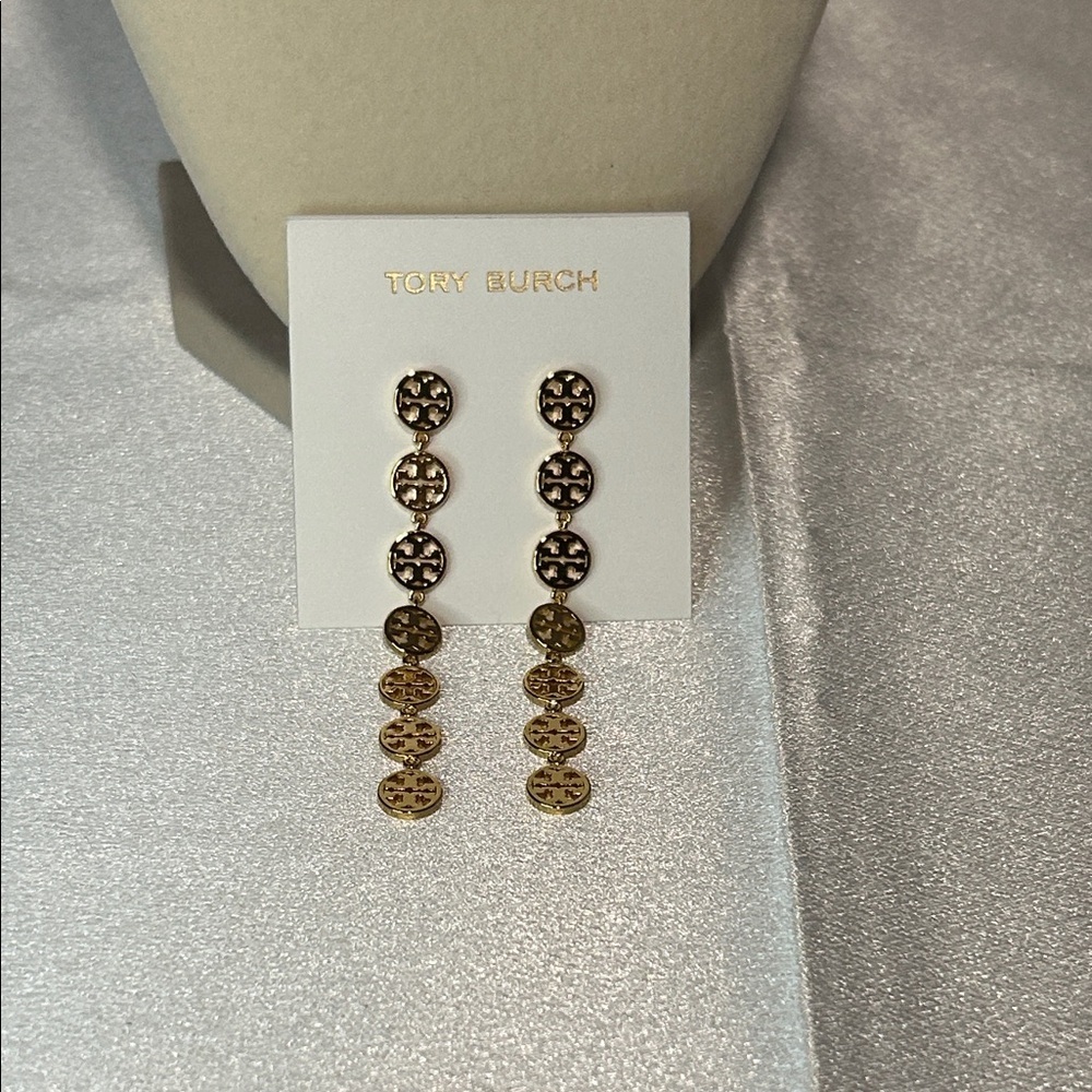 Brand new Tory Burch gold dangling earrings